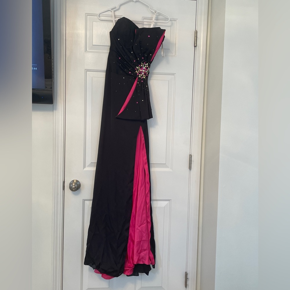 Tony Bowls black and pink formal dress. Size 6 but taken in as a 4